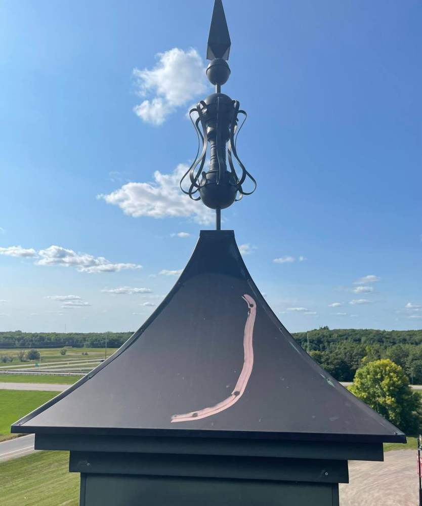 Paint-marked metal cupola roof photographed during the Grande Depot inspection in St. Cloud, September 2021