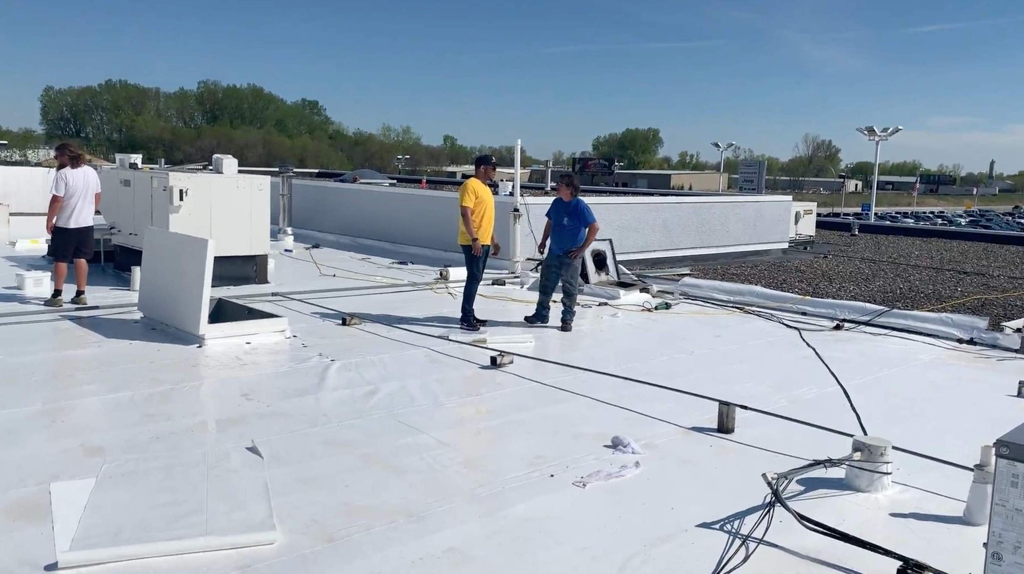 Repair King crew installing a commercial flat roof in Minnesota