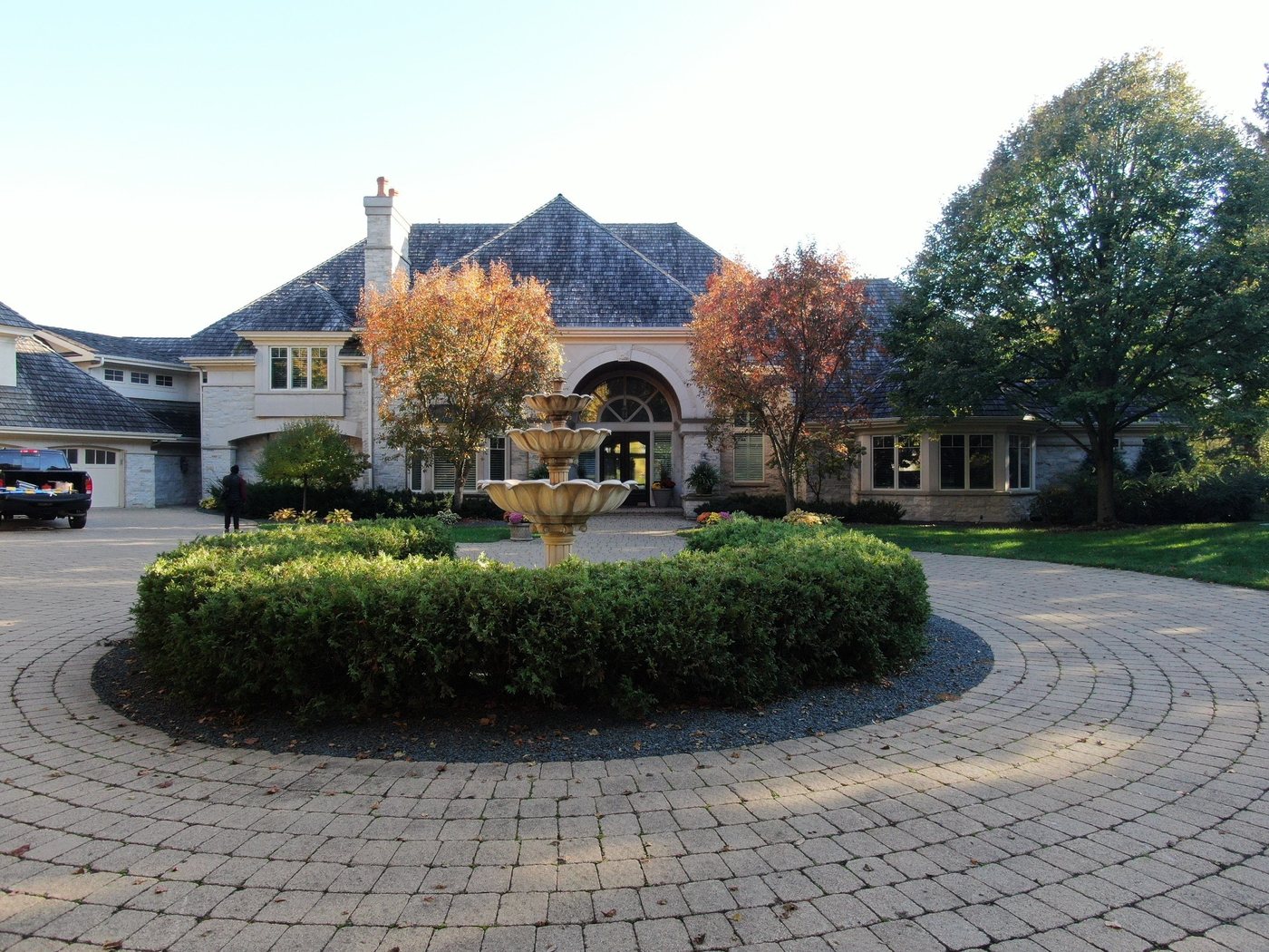 Front entry court of the same Lake Minnetonka estate, October 2023