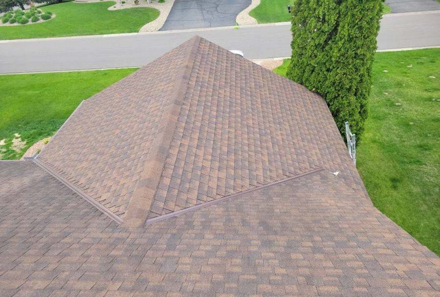 Overhead view of hip ridges and valleys on a Lakeville shingle roof during an inspection, May 2022