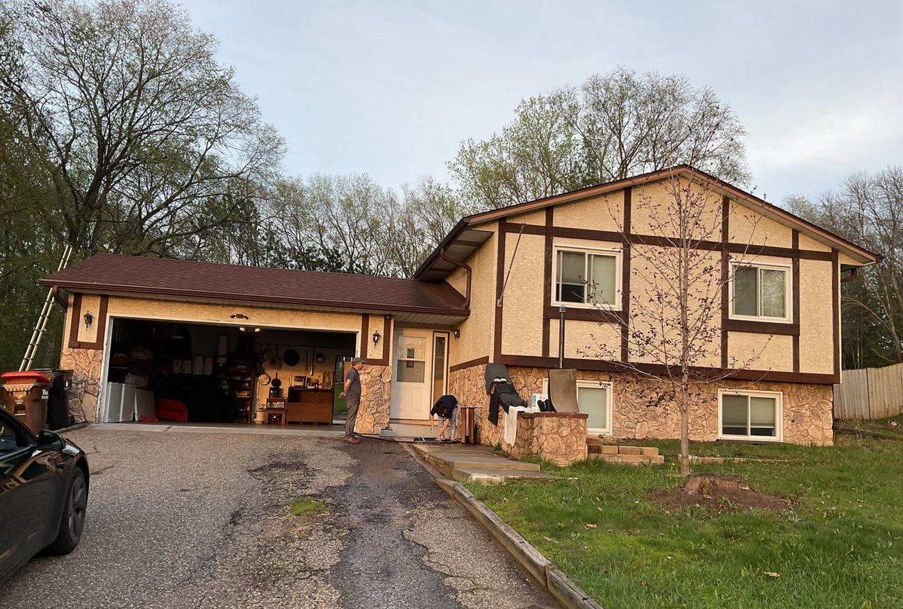 Split-level home in Maplewood, MN during a Repair King roof project, May 2023