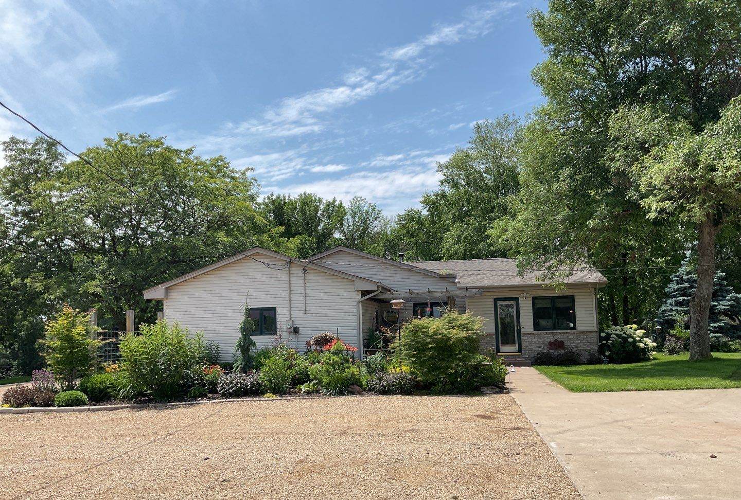 Ranch-style home in Farmington, MN photographed by Repair King during a July 2023 roof inspection