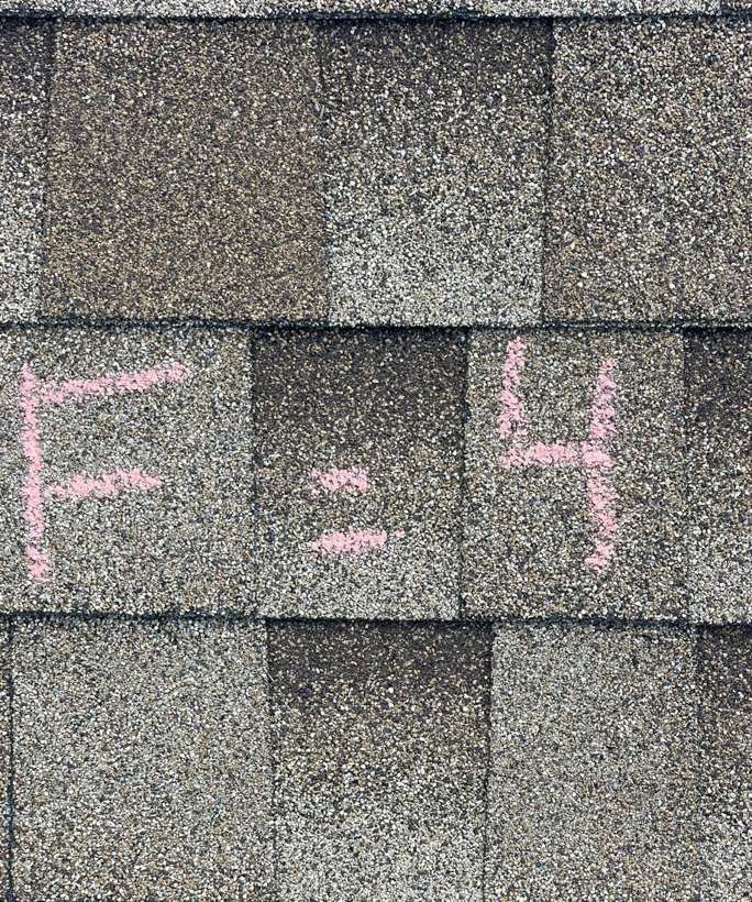Chalk-marked hail hit on a Lakeville shingle roof, July 2023