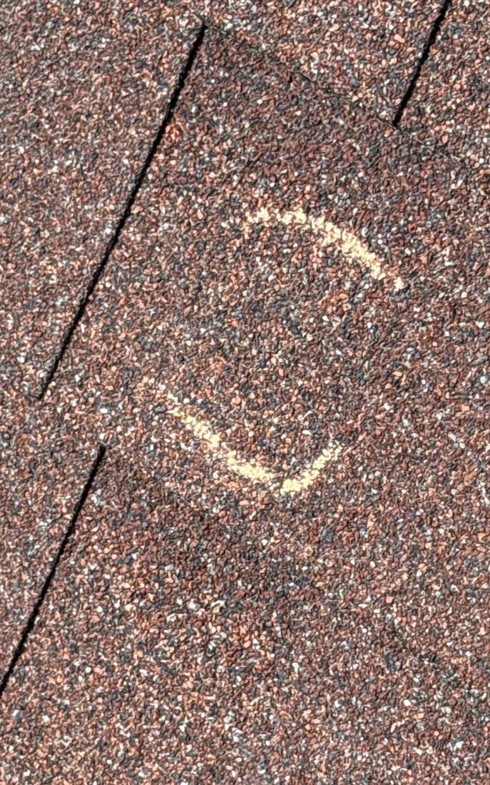 Hail hit chalk-marked on a Naperville roof slope, May 2026