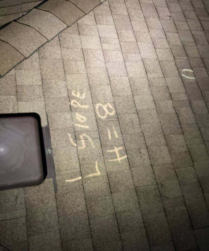 Chalk-marked hail hits and slope notes on a Maplewood roof, May 2023