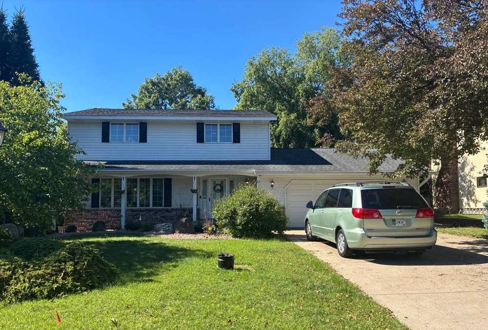 Two-story Roseville home on Willow Circle photographed during a roof inspection, June 2026