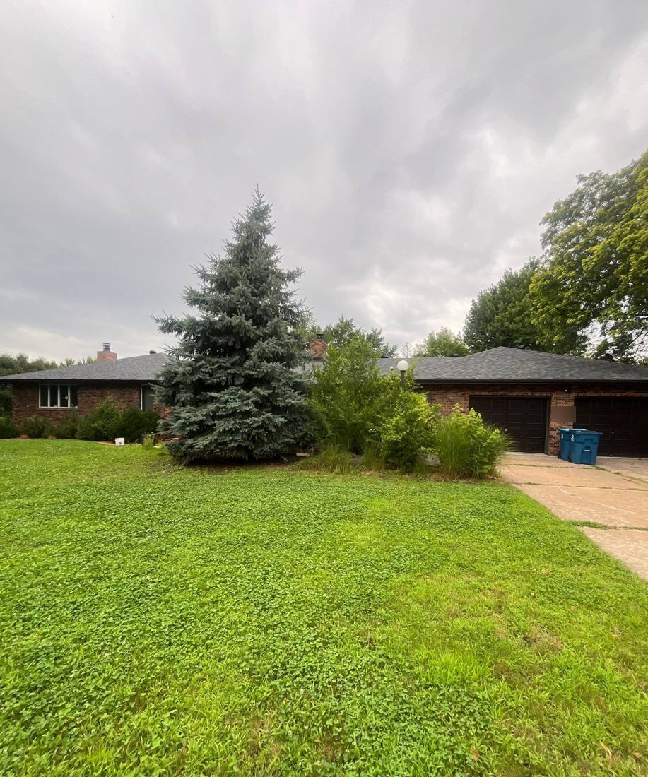 Brick rambler in Mendota Heights photographed during a roof inspection, August 2024