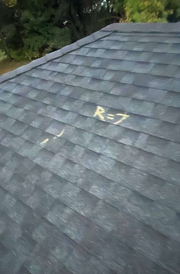 Roof slope with a marked hail test area near Litchfield, September 2023