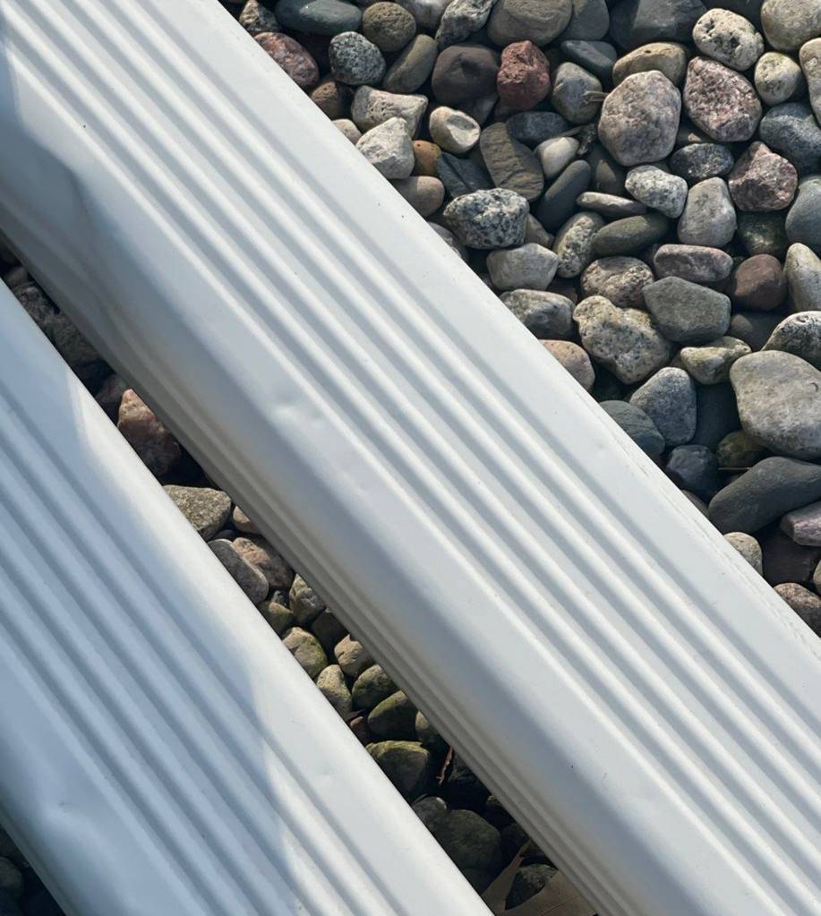 Close-up of a dented gutter section found on a Princeton inspection, May 2022