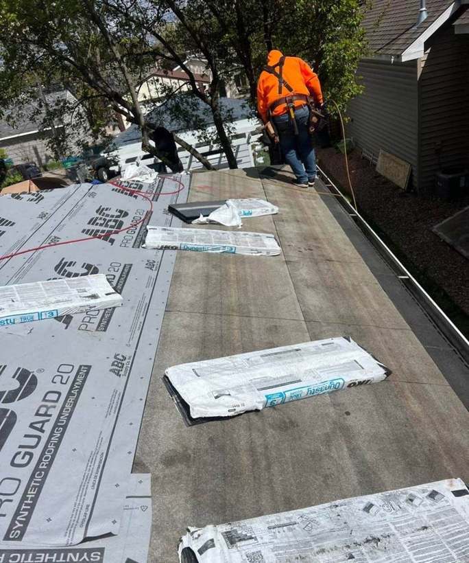 New underlayment going down during the May 2024 re-roof in east St. Louis Park