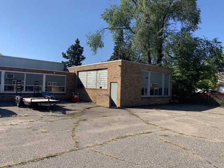 One of the brick Washington Place buildings in St. Cloud, seen from the lot during our September 2019 roof inspection