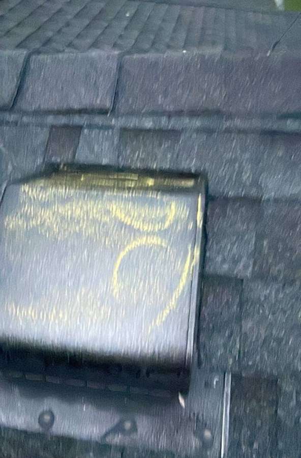 Hail spatter chalk-marked on a roof vent near Litchfield, September 2023