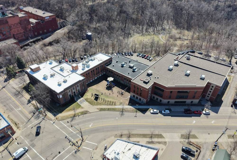Drone view of the HOPE Community Academy campus and its flat roofs in St. Paul, April 2026