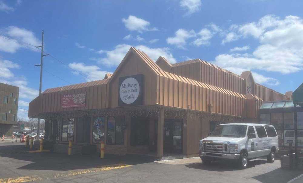 Midway Café & Grill storefront on University Avenue West in St. Paul, a Repair King commercial roofing job