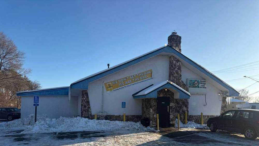 Exterior of Stevie's Bar in Crystal, MN, a Repair King commercial roofing and ice dam job
