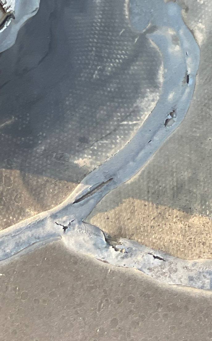 Cracked membrane seam on the Budget Inn & Suites roof in Eagan, MN