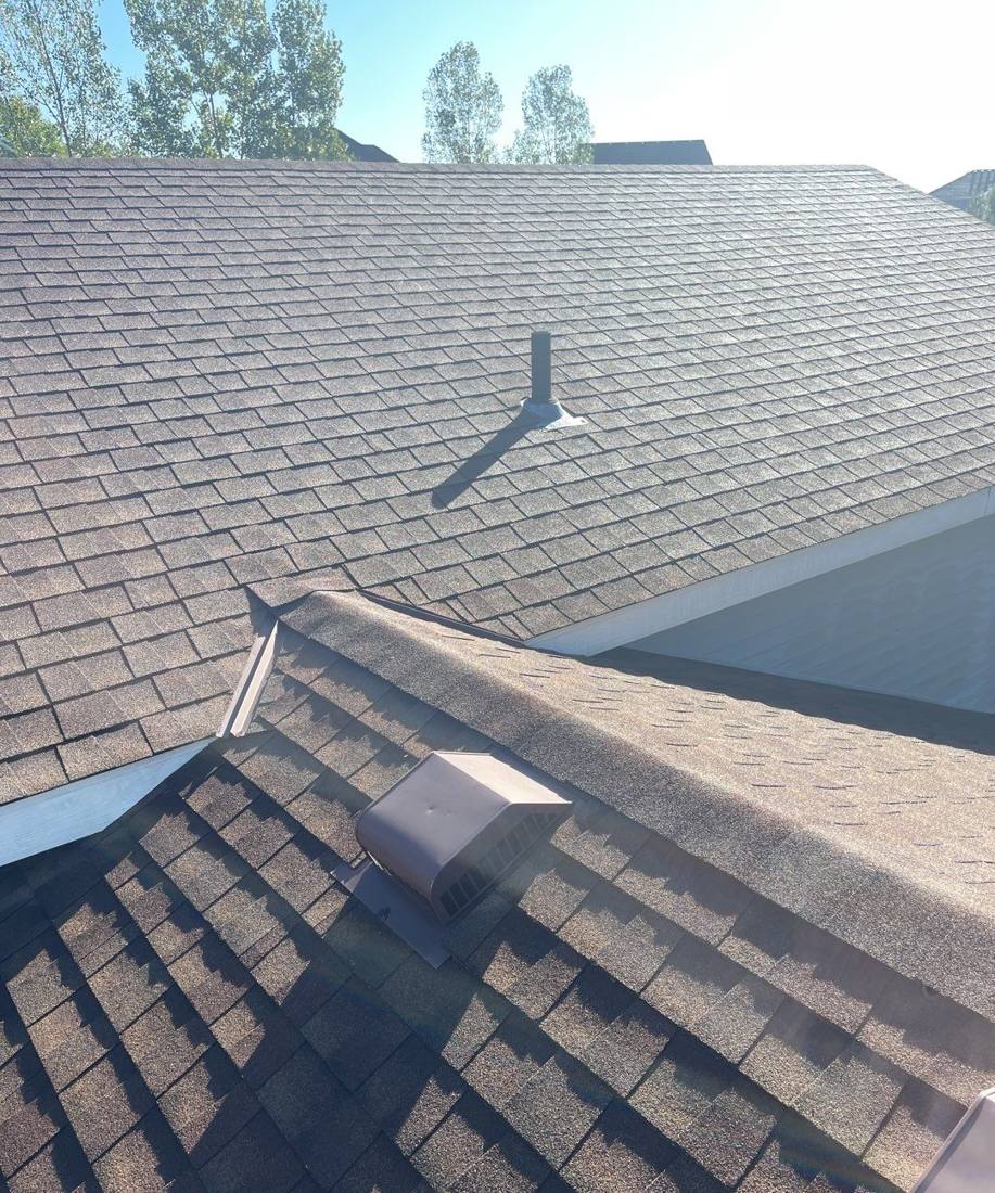 Close-up of a roof vent and ridge cap on a Sartell home, September 2021