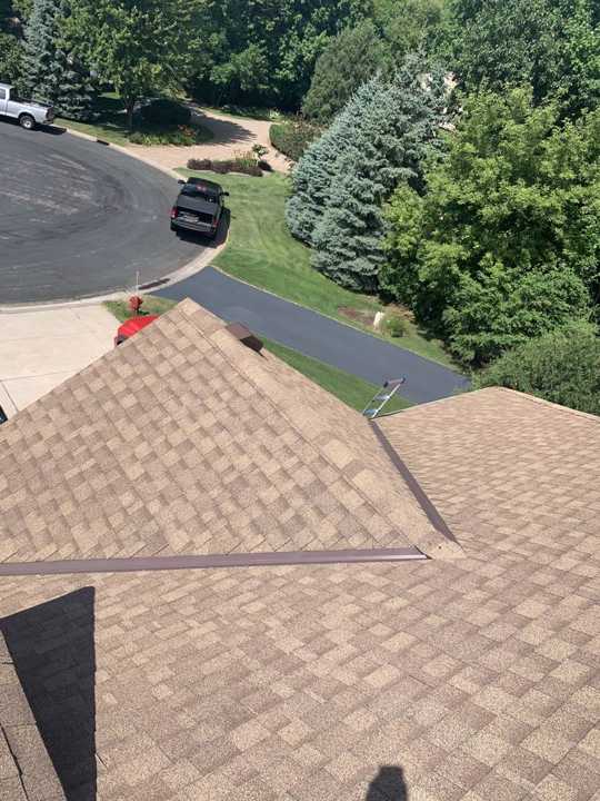 Shingle roof slopes on a walkout two-story home in Maple Grove, MN, photographed by Repair King in July 2020