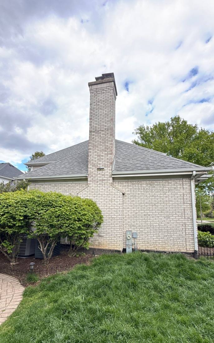Chimney flashing inspected on a Hinsdale roof, May 2026