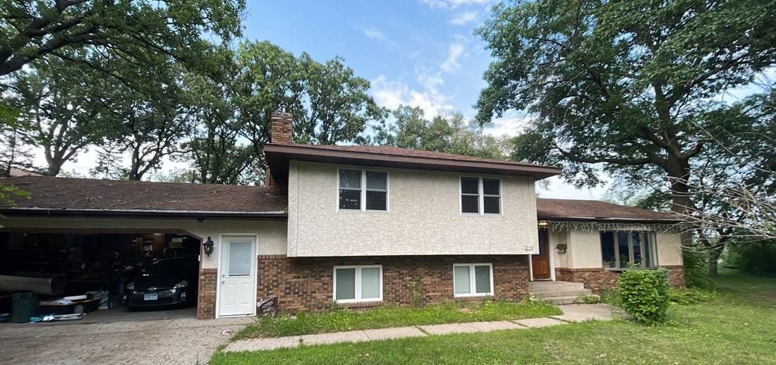 Split-level South St. Paul home during a roof inspection, August 2023
