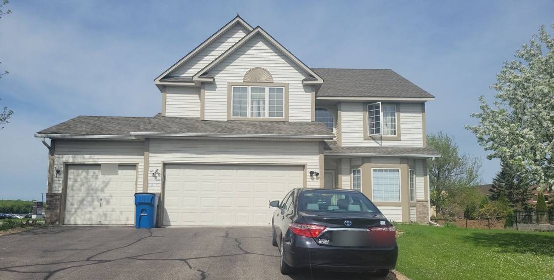 Two-story Shakopee home during a follow-up roof inspection, May 2022