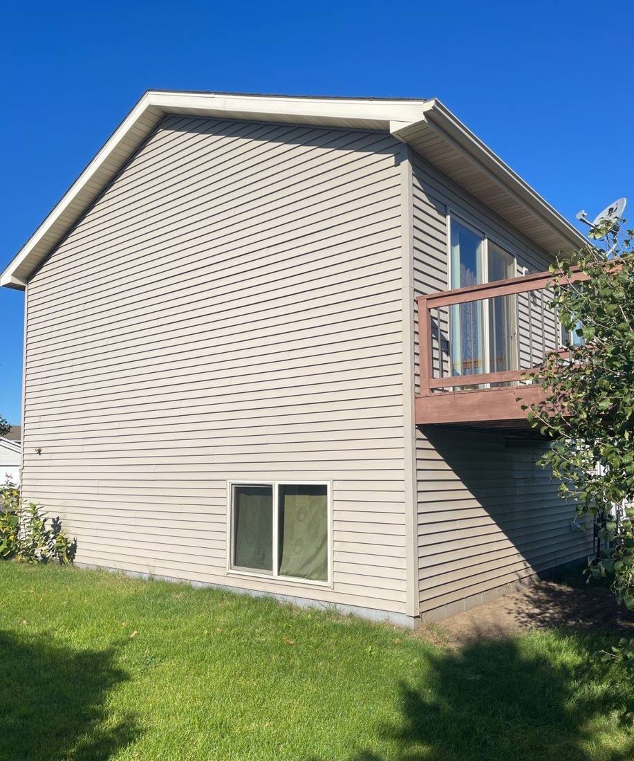 Deck stairs at a Sartell home photographed during a roof inspection, September 2021