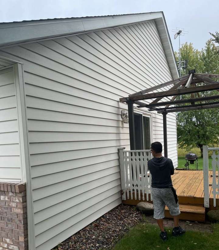 Siding and the back deck of a Sauk Rapids home during an October 2021 inspection