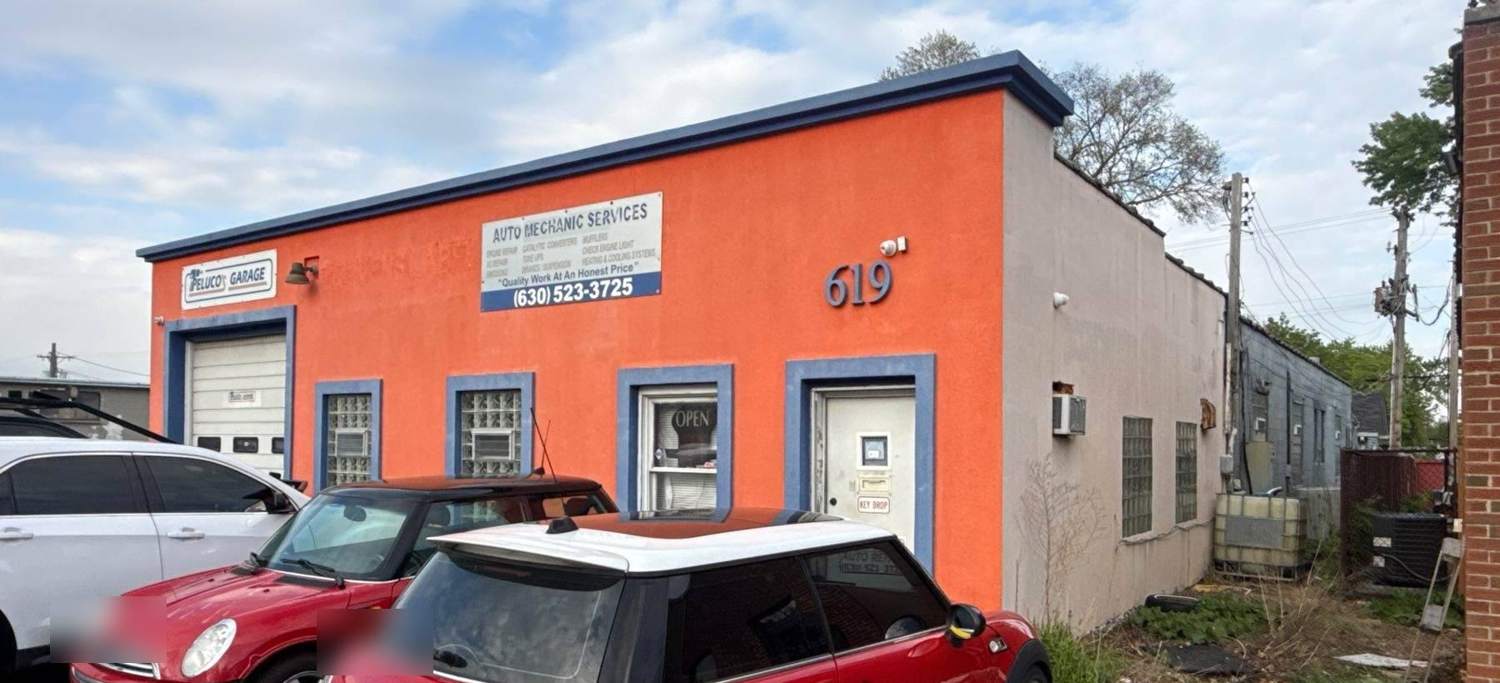 Peluco's Garage auto repair shop in Villa Park, IL, photographed during Repair King's 2026 commercial roof inspection