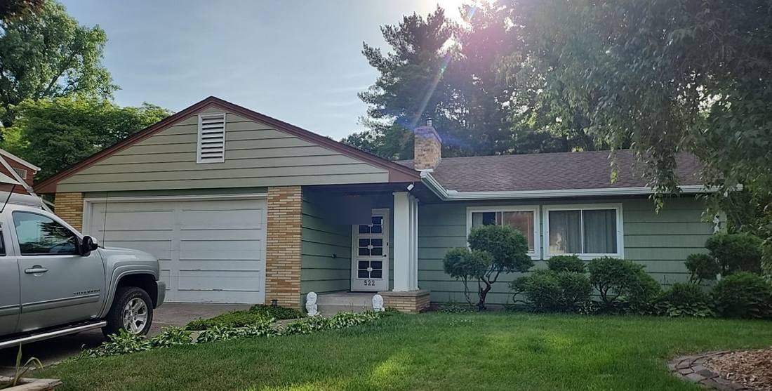 Brick and stucco ranch home in South St. Paul, July 2023