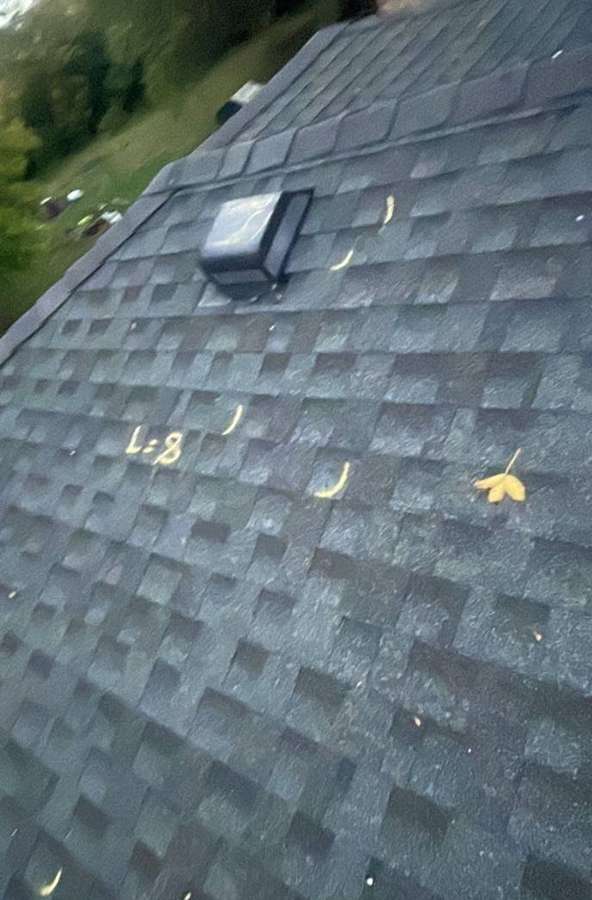 Chalk-marked hail hits across a roof slope near Litchfield, September 2023