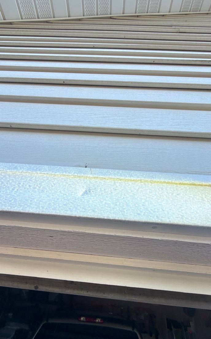 Hail-dented roof vent cap found during a Rochester inspection, April 2026