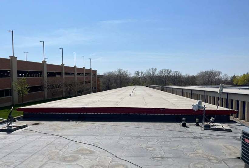 Low-slope membrane roofs over the storage buildings at iStorage SLP in St. Louis Park, MN, during Repair King's April 2024 inspection