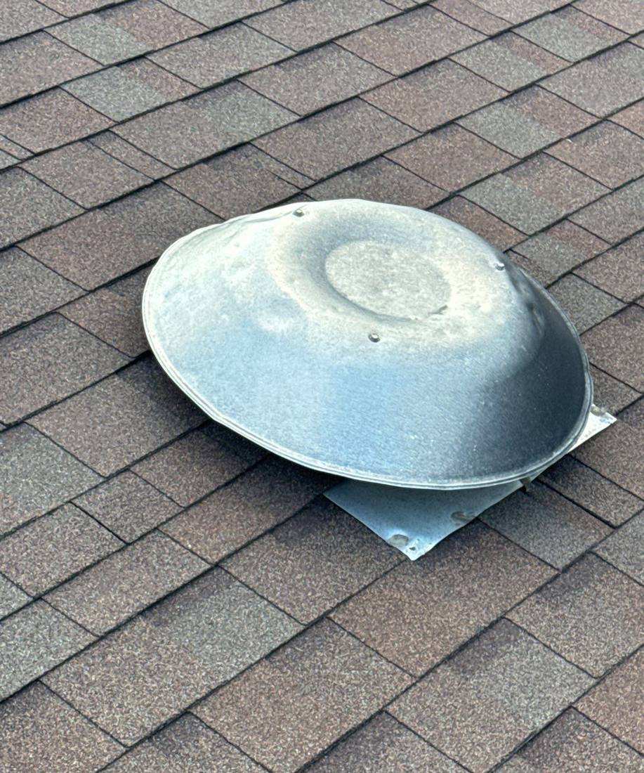Dented roof vent cap found during the Shoreline Commons inspection, April 2024