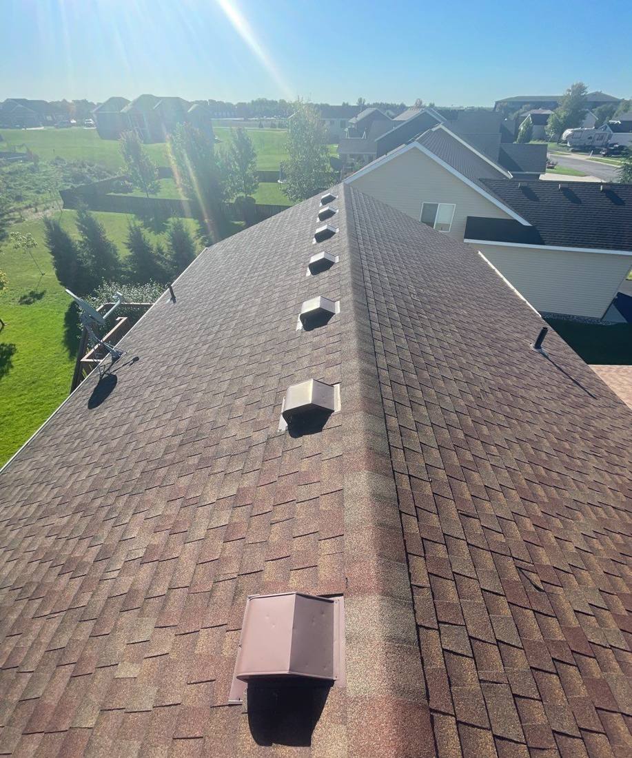 Row of roof vents along a Sartell ridge line during an inspection, September 2021