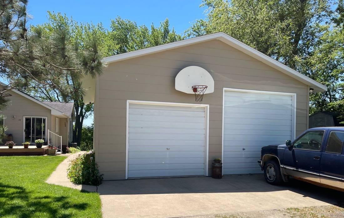 Detached garage on a Pine Island property photographed during an inspection, June 2022