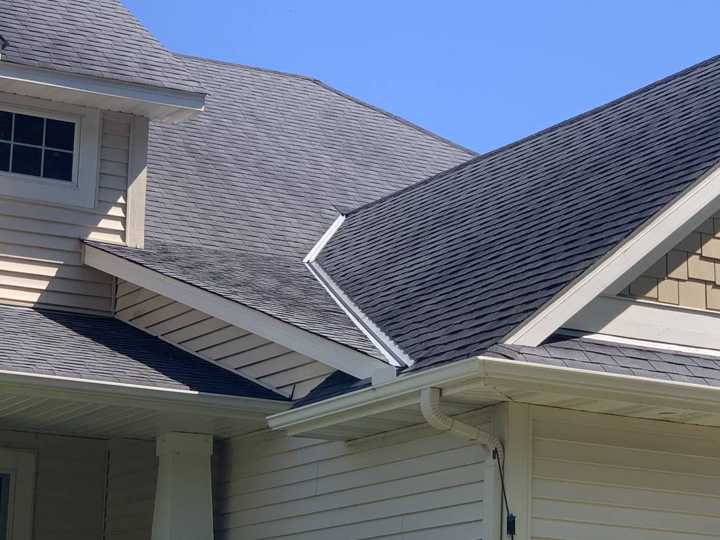 Gray shingle roof, gables and gutters on a Rockford, MN home, photographed from the eaves during a Repair King inspection, July 2020