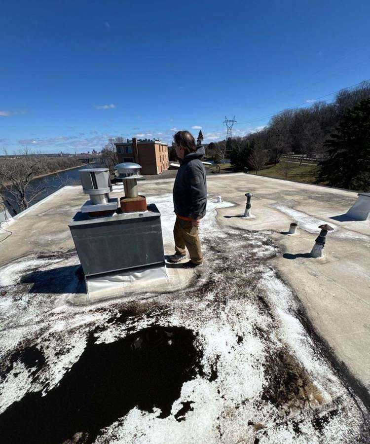 Rooftop view toward the Mississippi River from a Townhome Colony Association building near Sibley Memorial Highway, March 2024