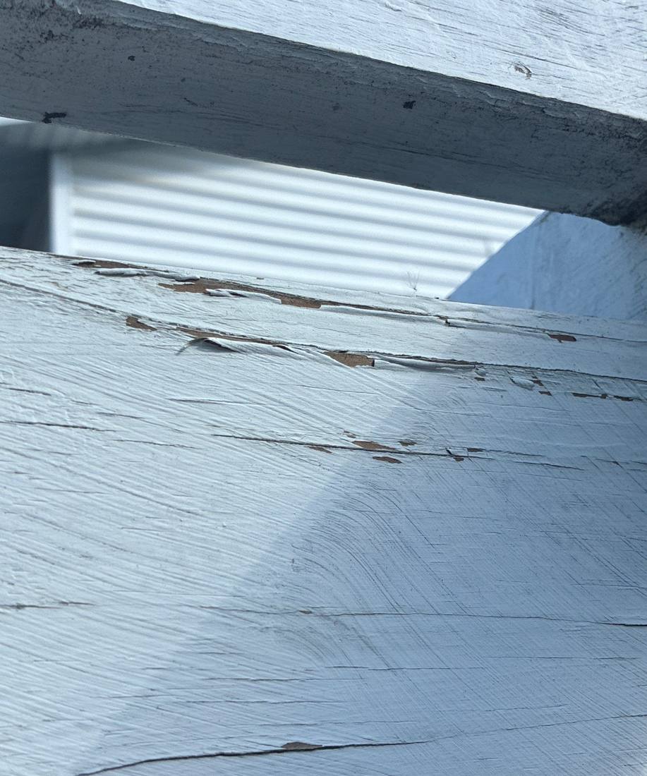 Cracked and rotted fascia board found during a Bolingbrook roof inspection, May 2026