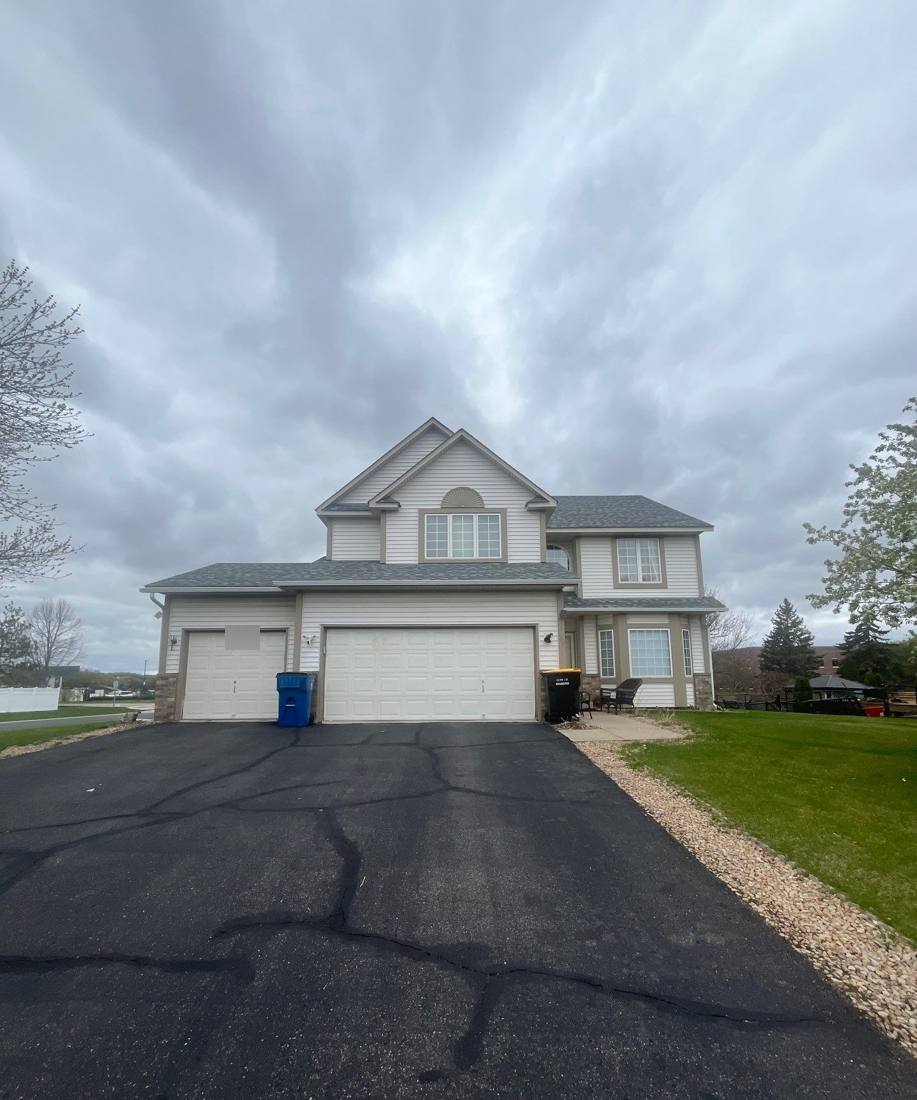 Two-story home in Shakopee, MN photographed by Repair King during an April 2024 roof inspection