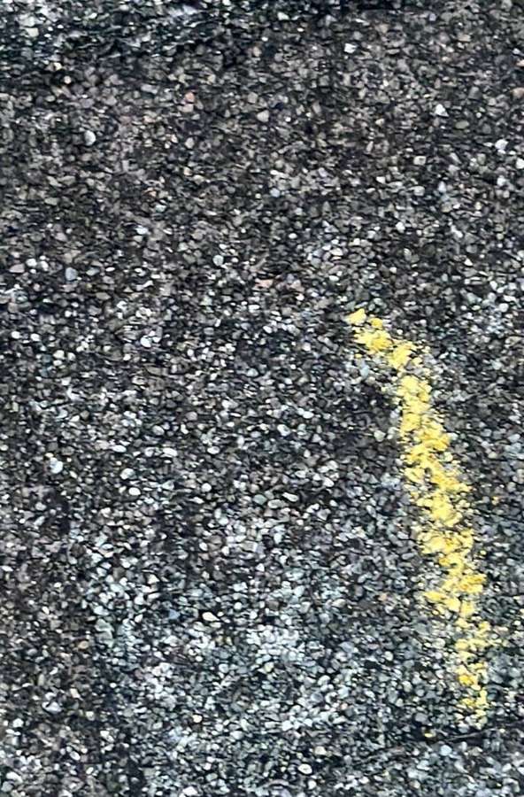 Chalk-circled hail hit on a shingle near Litchfield, September 2023