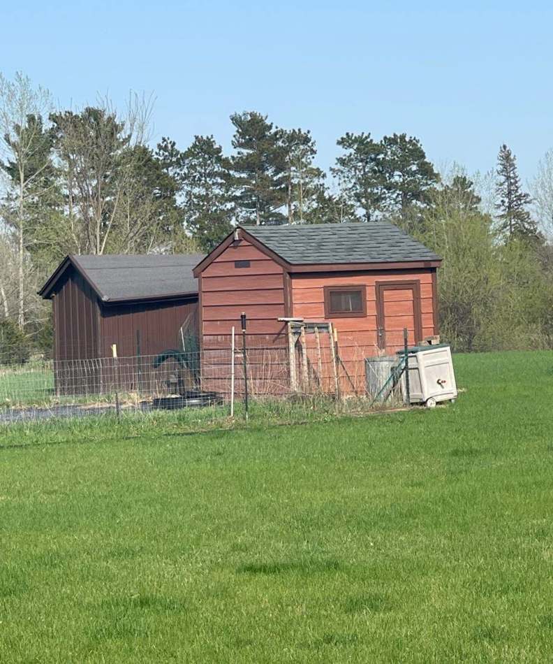 Farm outbuildings on a Princeton-area property photographed during a roof inspection, May 2022