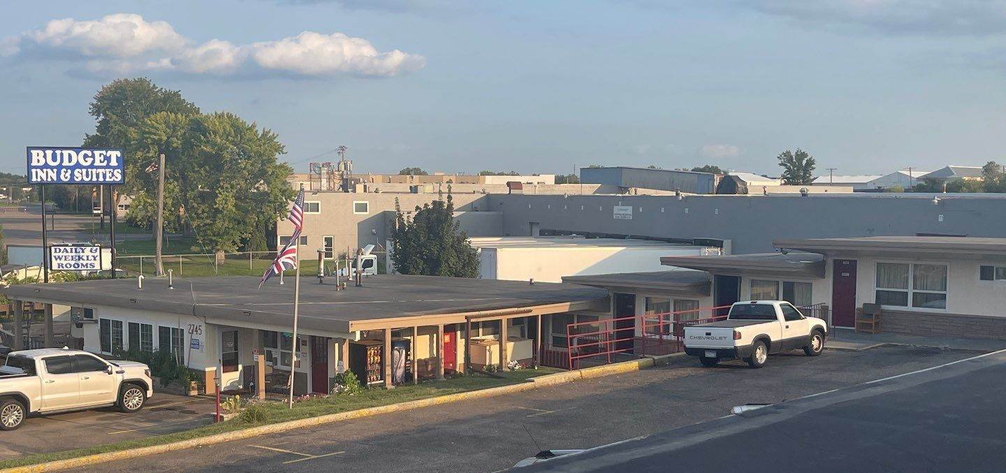 Budget Inn & Suites motel on Highway 55 in Eagan, MN, photographed by Repair King during a 2022 commercial roof inspection