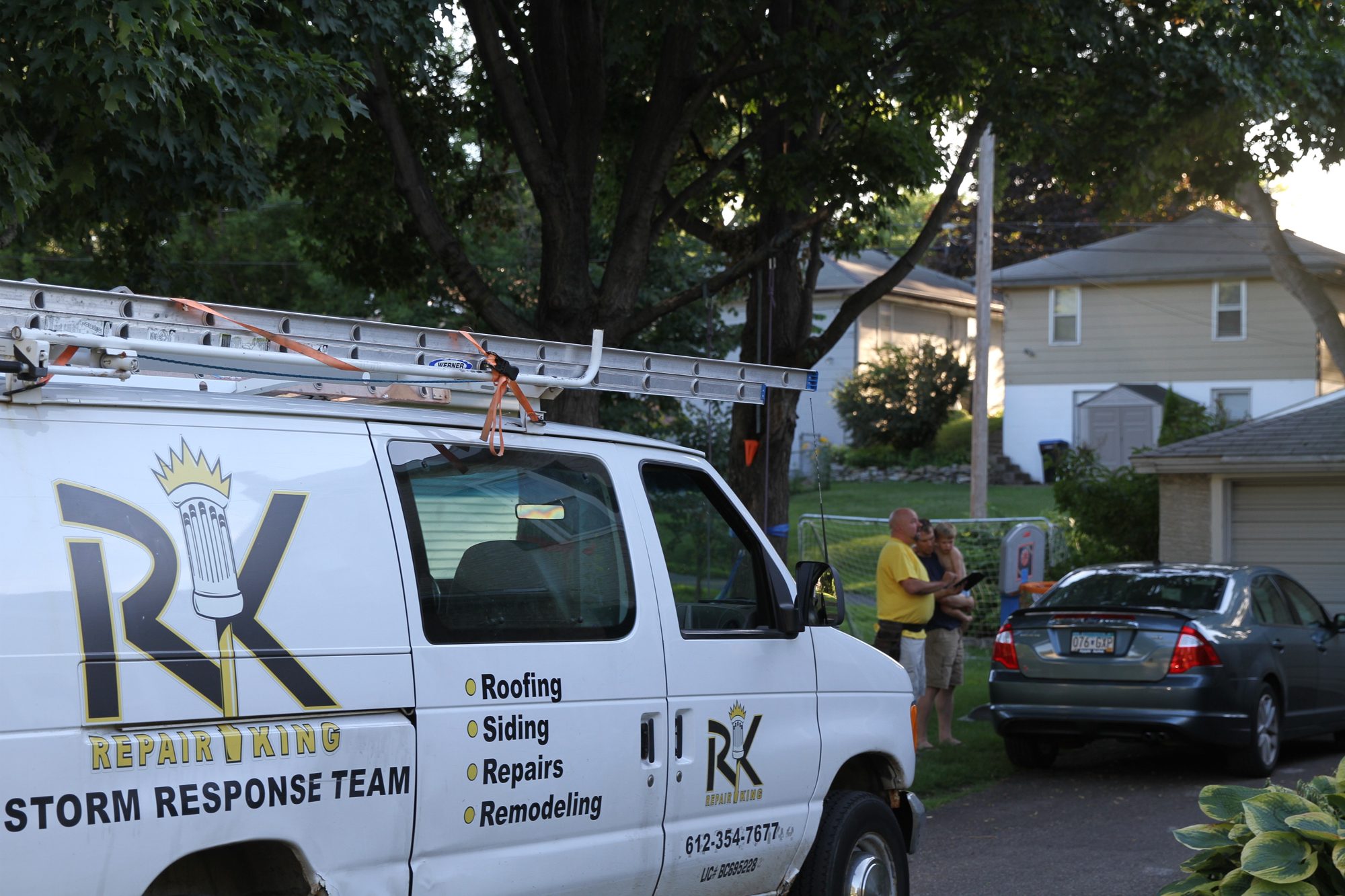Repair King Storm Response Team van at a Twin Cities home