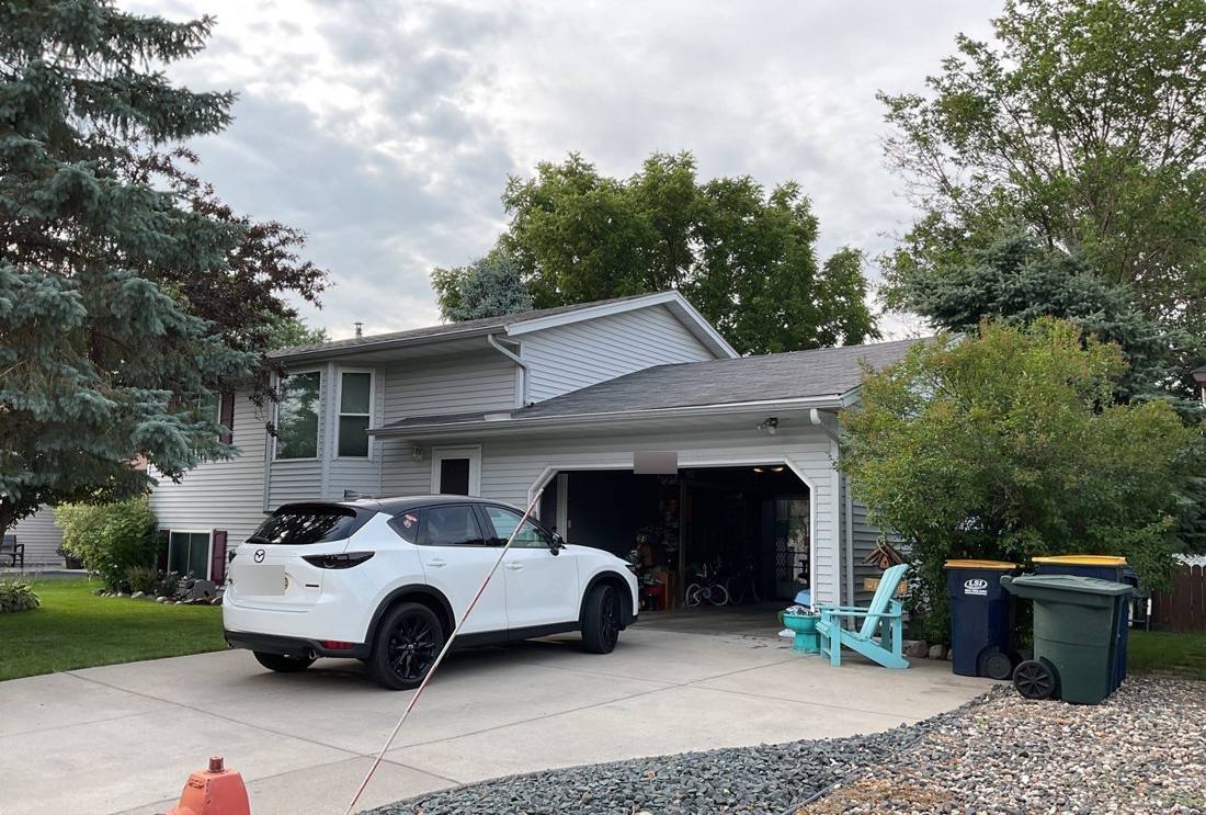 Farmington home photographed during a roof inspection, July 2023