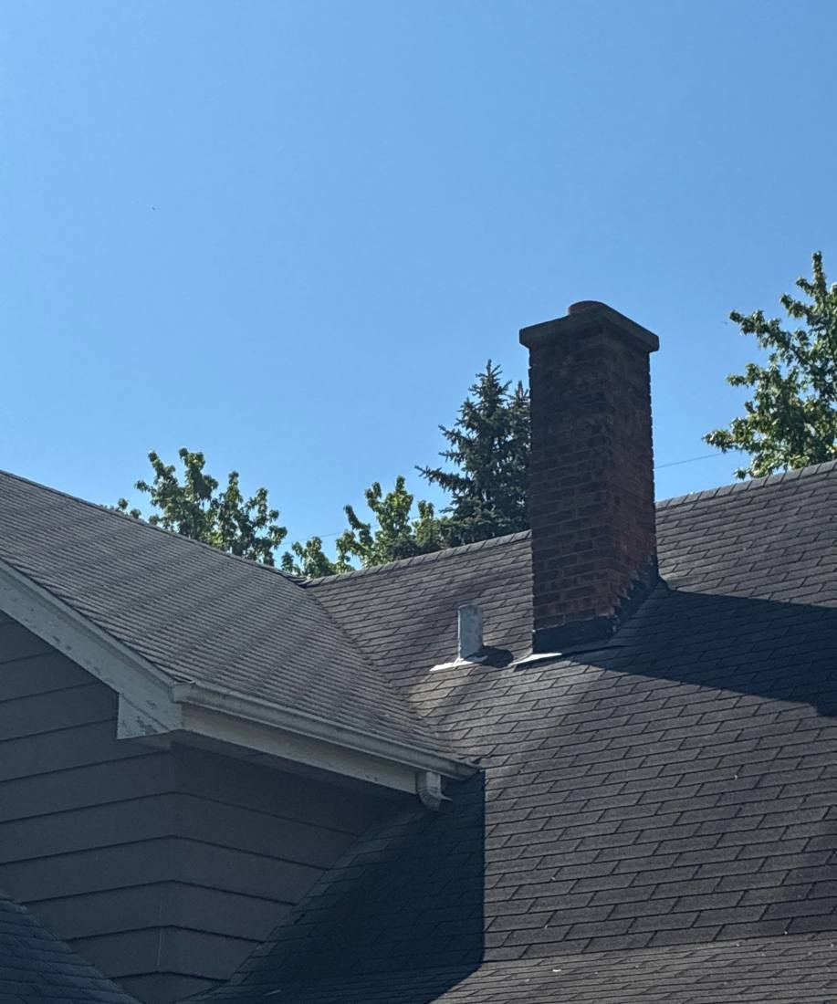 Chimney flashing on a Naperville roof, May 2026