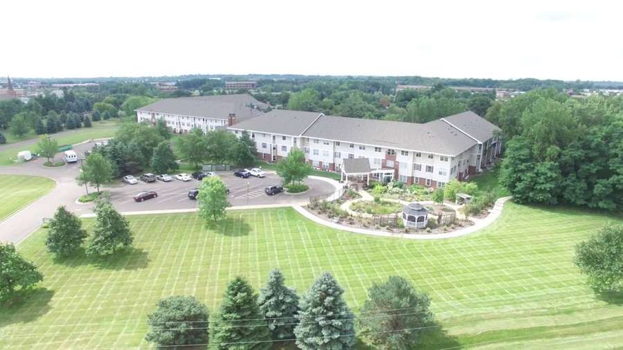 Drone photo of Oak Meadows Senior Living, a three-story senior residence in Oakdale, MN, where Repair King did siding and roofing work