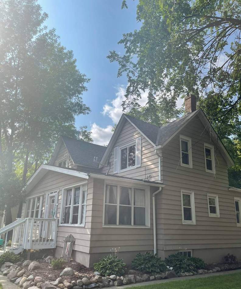 Early-1900s home near downtown New Prague photographed during a roof project, October 2021
