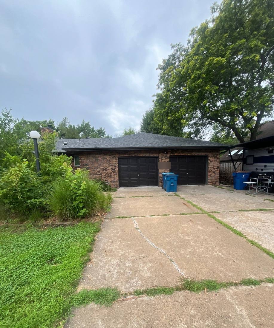 Attached garage and roofline on a Mendota Heights home, August 2024