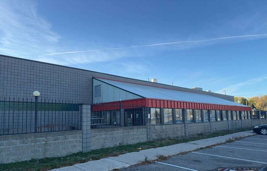 The Marketplace grocery store building in Cokato, MN, photographed during Repair King's October 2023 inspection