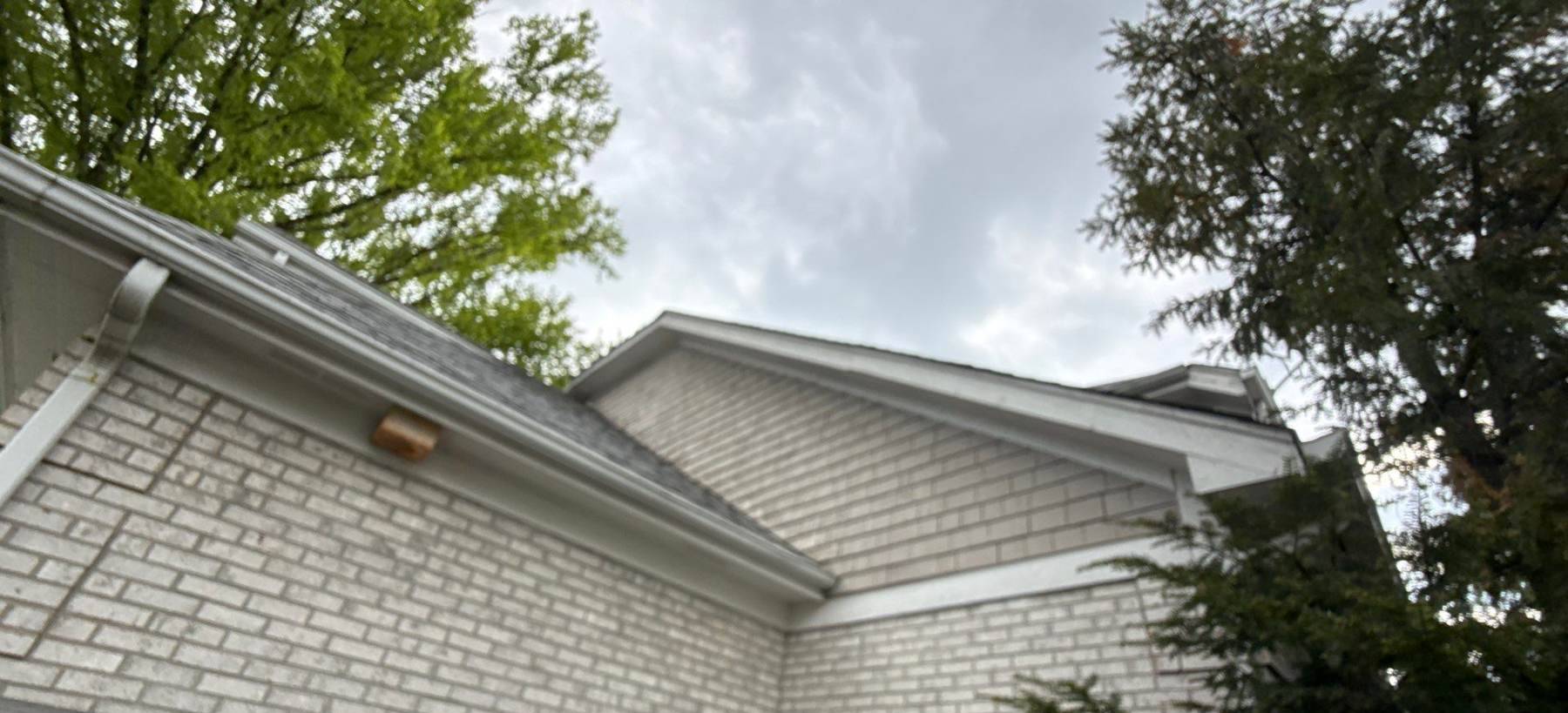 Large two-story home in Hinsdale, IL photographed by Repair King during a May 2026 roof inspection